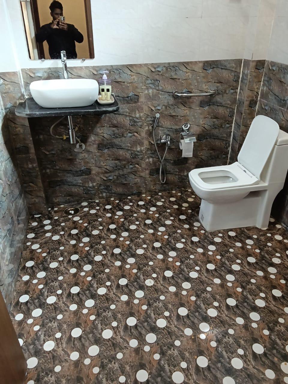 Luxury resort pool with palm trees at sunset